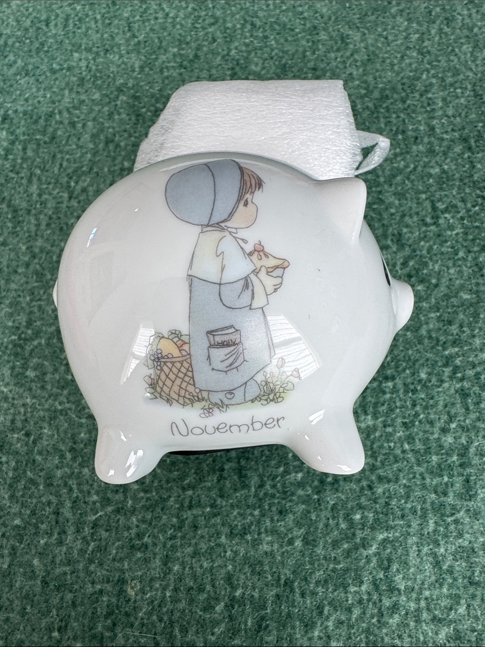 Porcelain 'November' Piggy Bank with Illustrated Child